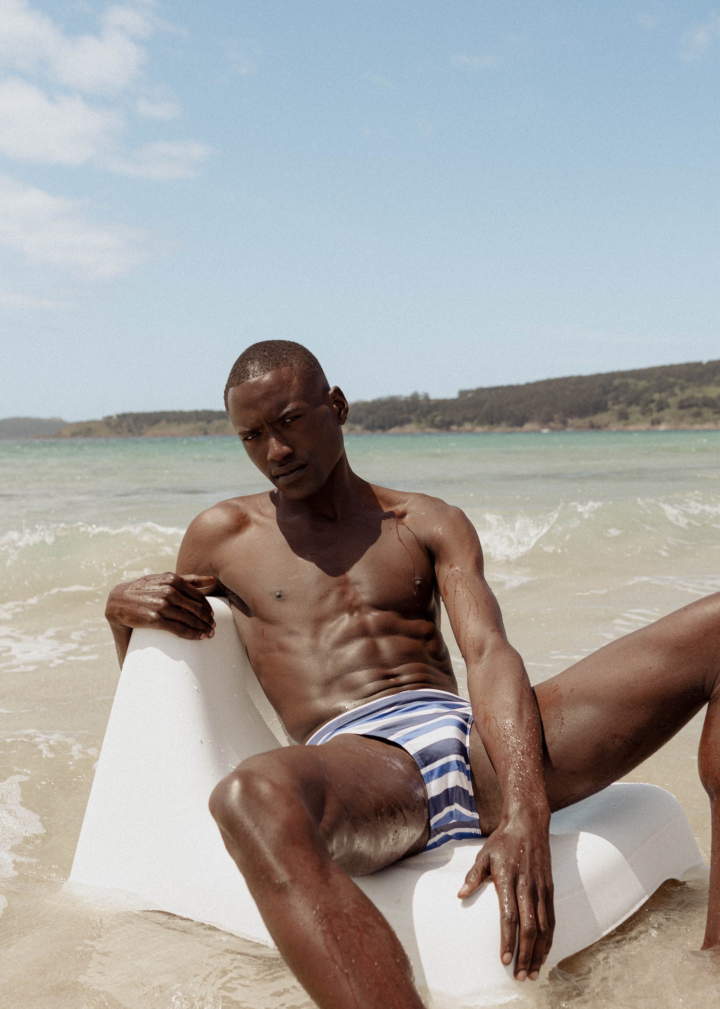 SLIM FIT SWIM BRIEF – BLUE STRIPE PRINT