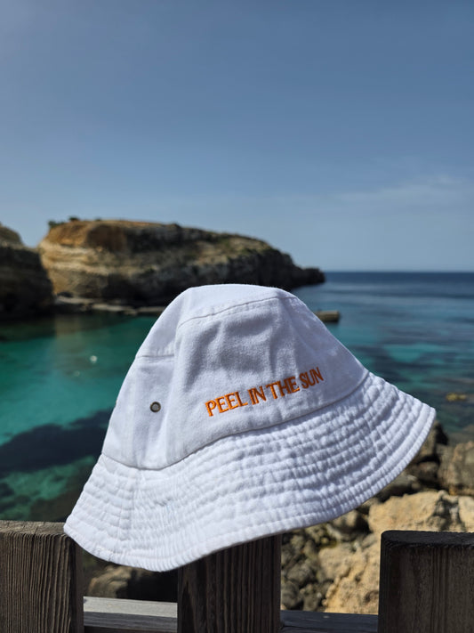 BUCKET HAT ECRU -" PEEL IN THE SUN" SLOGAN